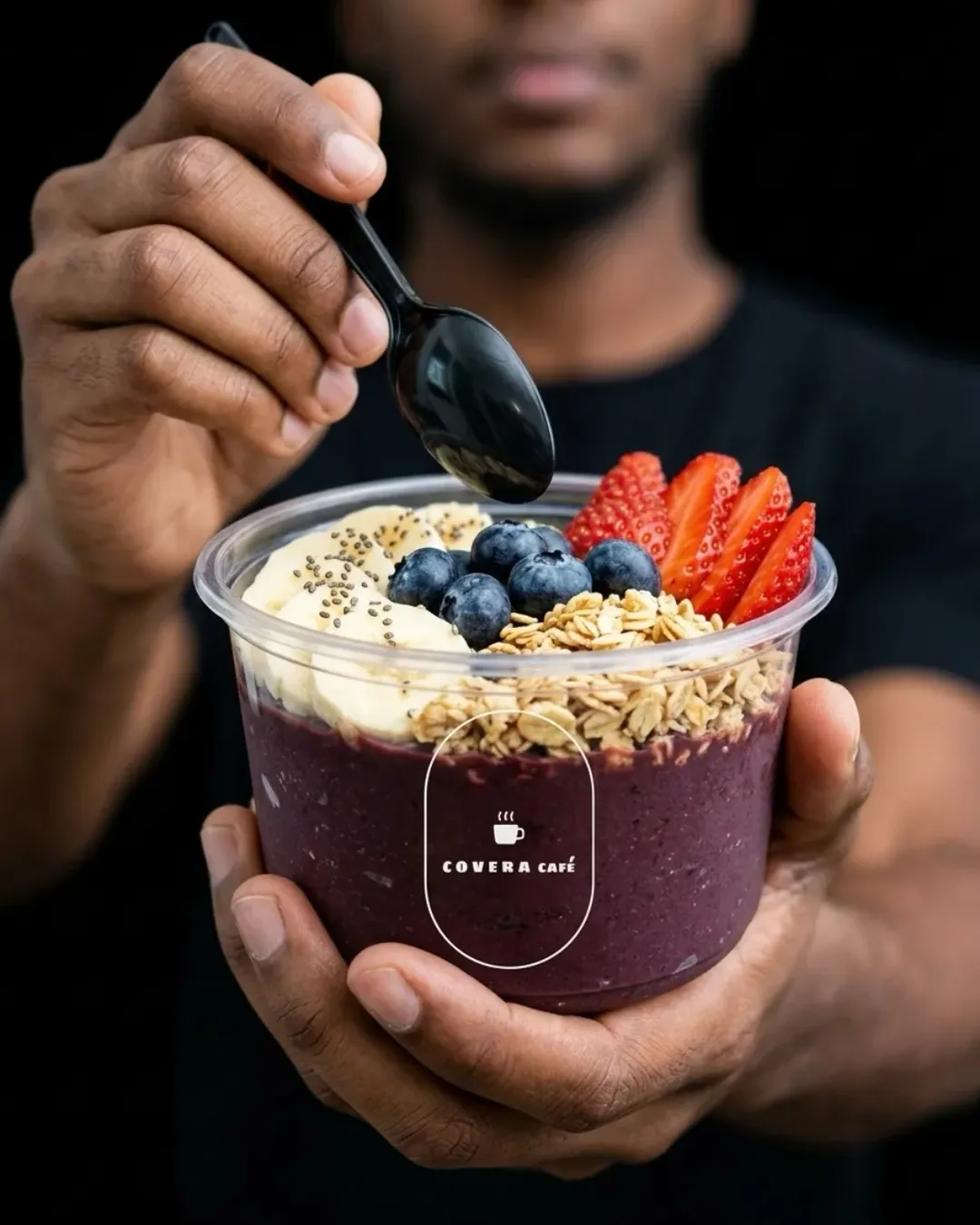 Covera Cafe açaí bowl topped with banana, berries and granola